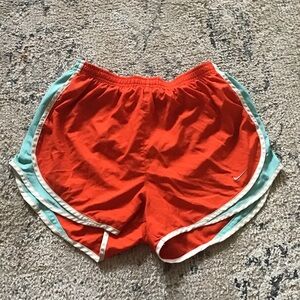 Nike Women's Vibrant Orange Athletic Shorts